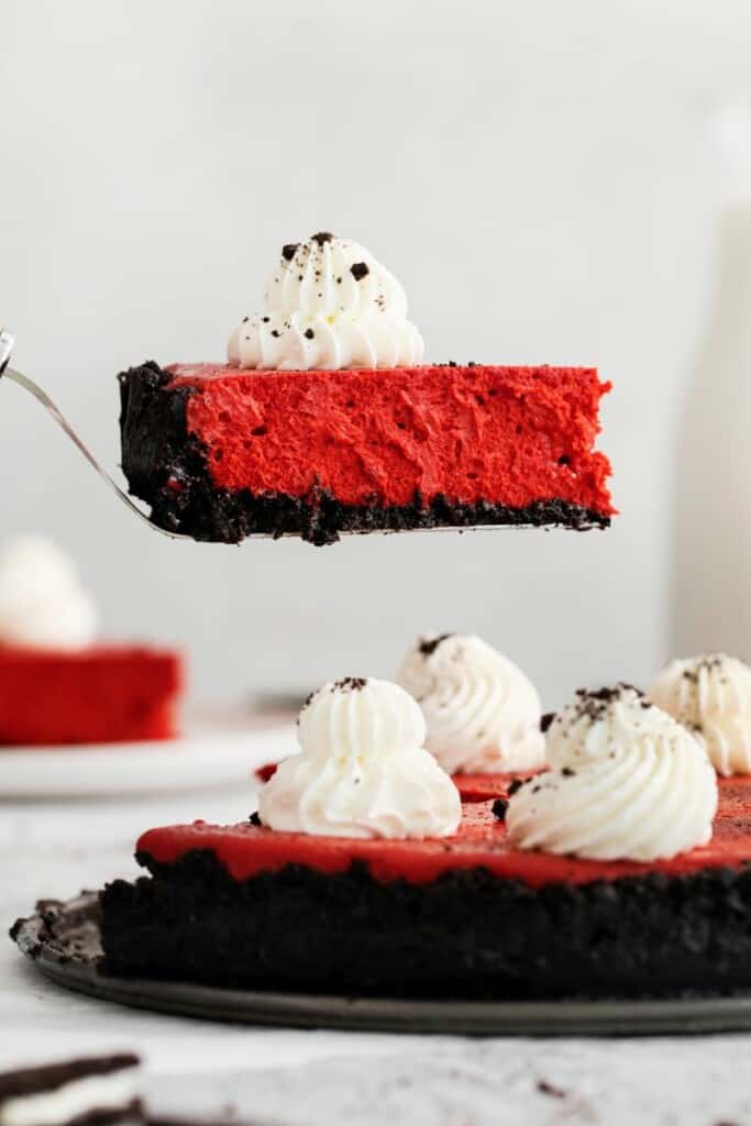 Slice of cheesecake being lifted out