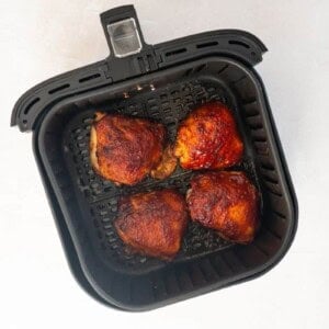 air fried chicken thighs in air fryer basket