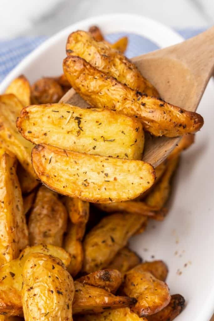 wooden spoon with fingerling potatoes