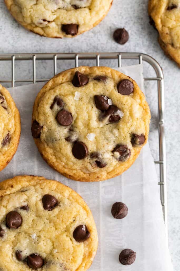 Close up of the chocolate chip cookie recipe without brown sugar on a wire rack.