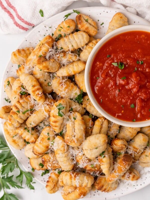 gnocci on platter with sauce