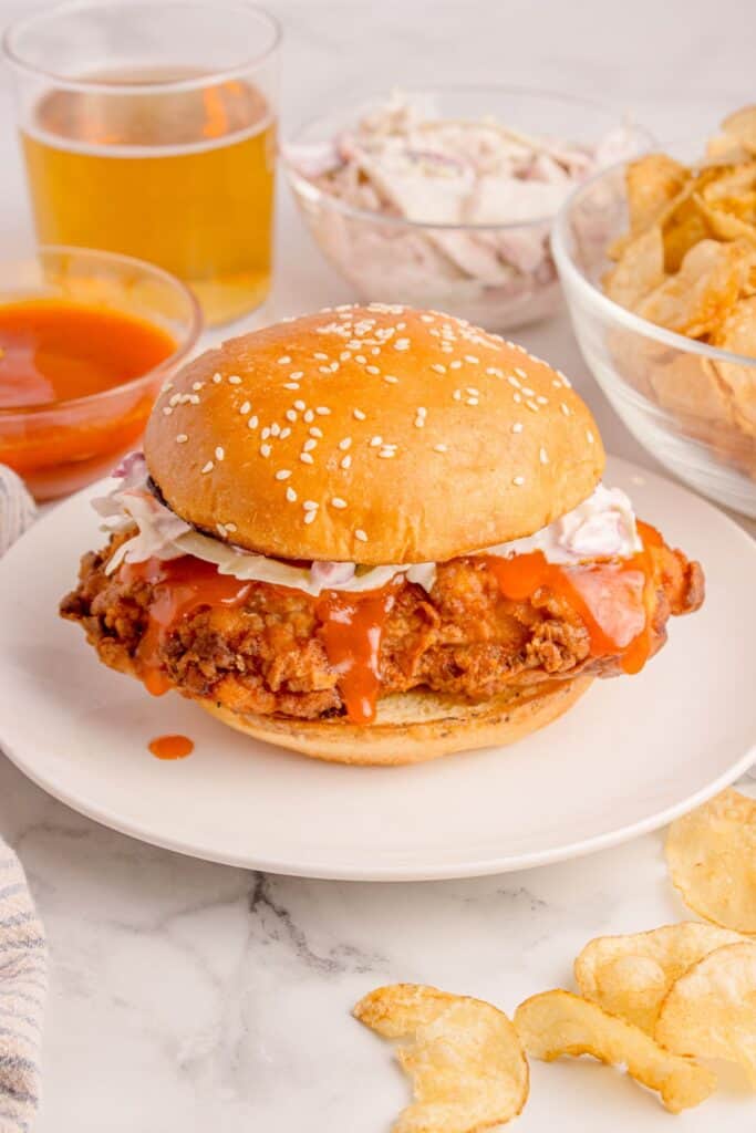 Buffalo sandwich on a white plate.