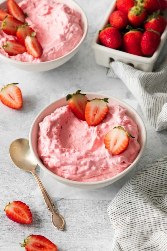 fresh berries in a bowl with cottage cheese jello salad