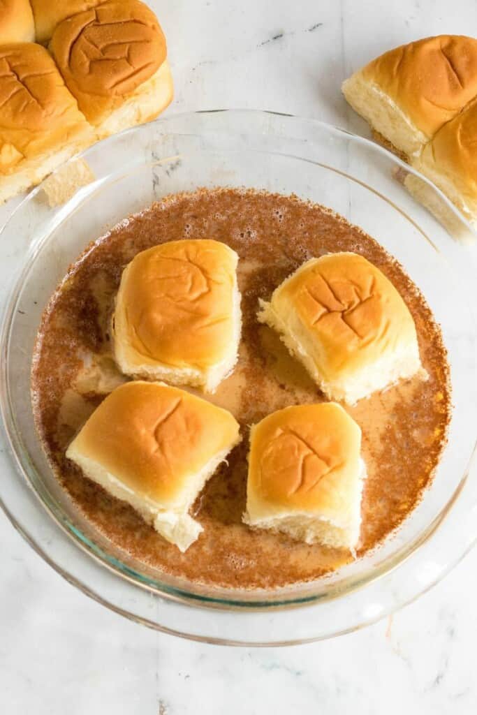 dipping bread into liquid