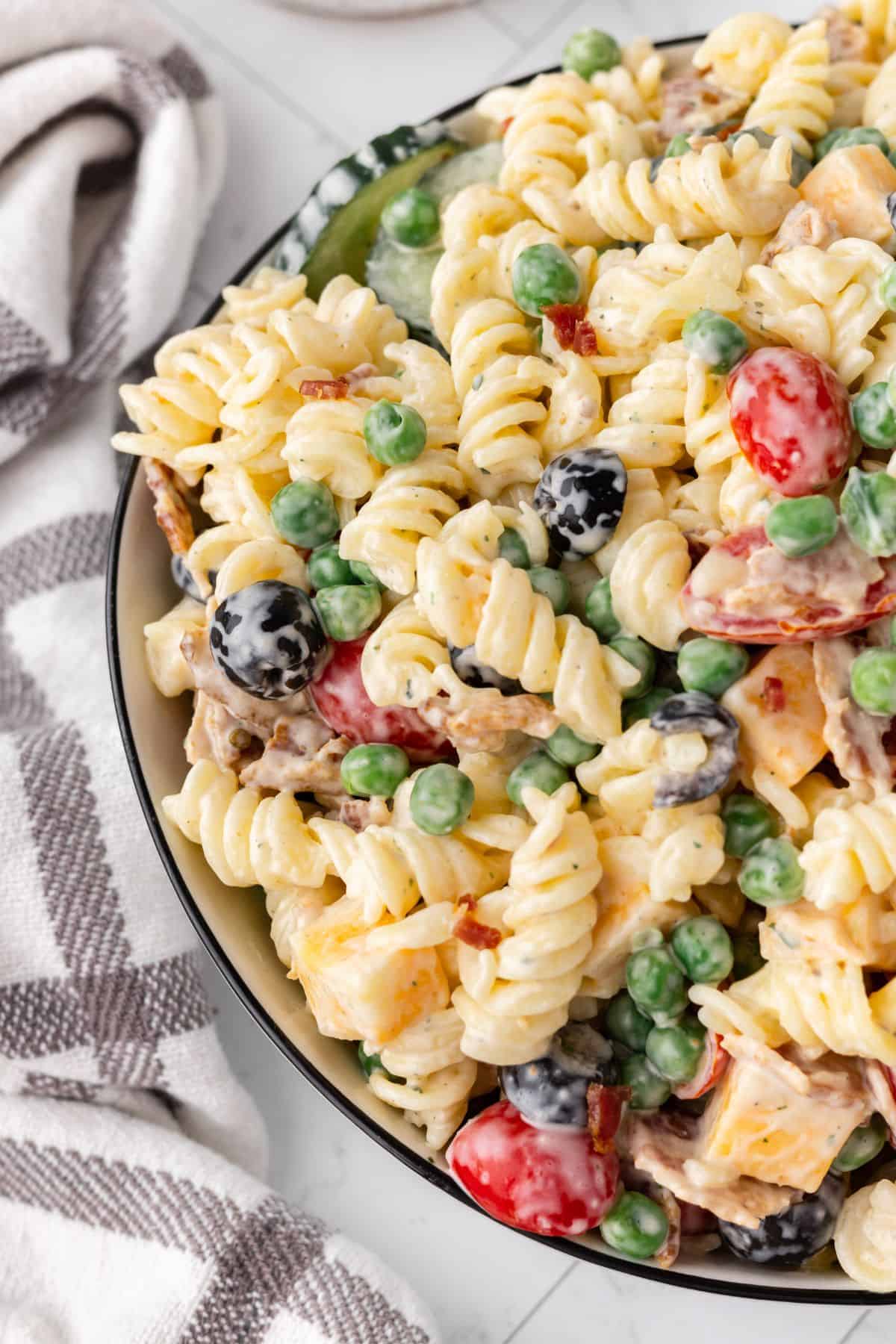 Bacon ranch pasta salad in a bowl to serve.
