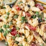 Closeup to see the pasta salad with bacon and ranch in a serving bowl.