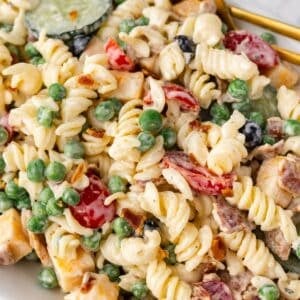 Closeup of the bacon ranch pasta salad in a serving dish.