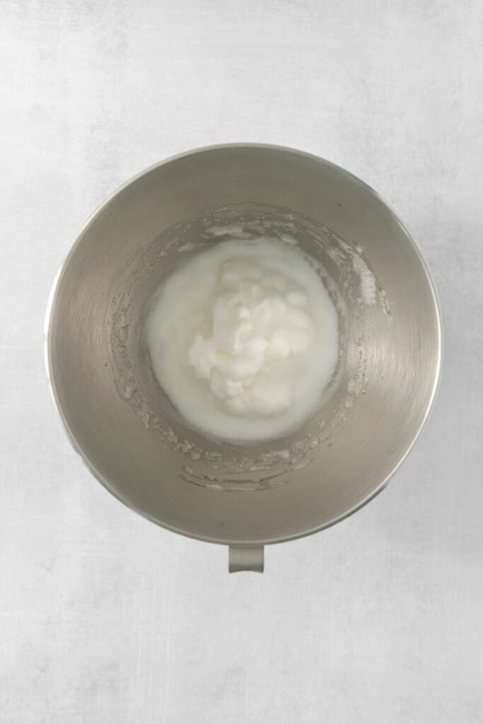 Egg whites separated from yolks in a mixing bowl.