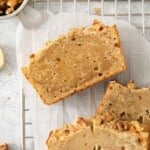 Slices of baked banana bread on a cooling rack.