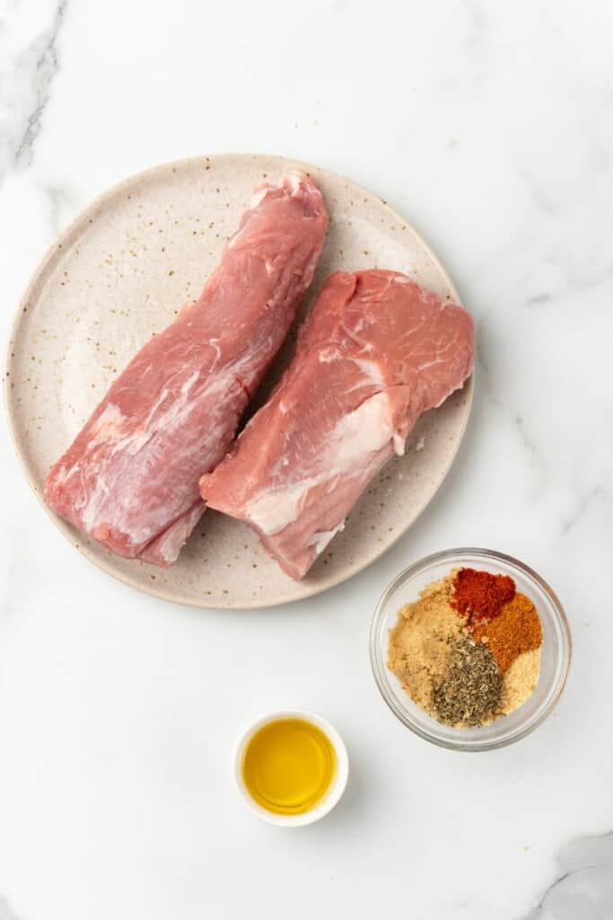 Overhead view of ingredients needed to prepare pork tenderloin in a Ninja Foodi.