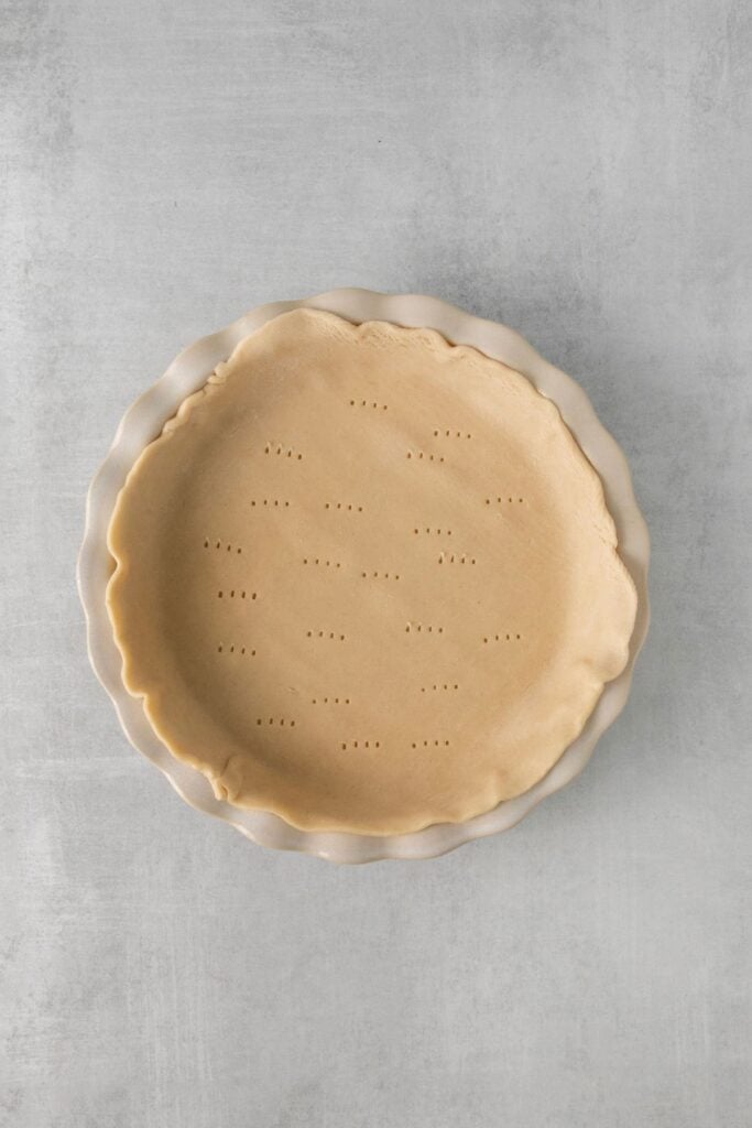 Pie crust pressed into the pie pan.