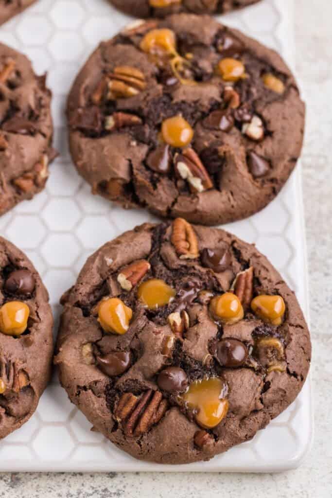 Close up of the pecan turtle cookies that are fully baked.
