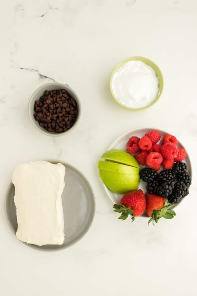 Ingredients needed to prepare chocolate fruit dip.