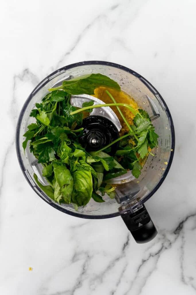 Ingredients for Lemon Herb Tahini added to a food processor.