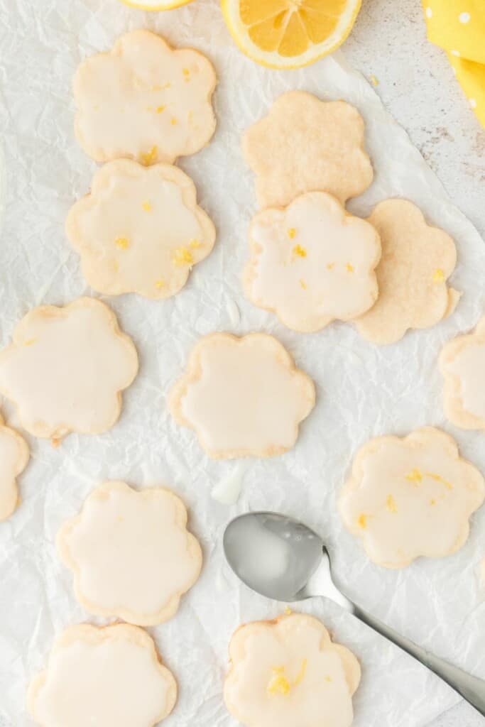 A batch of cookies that have been spoon glazed after baking.
