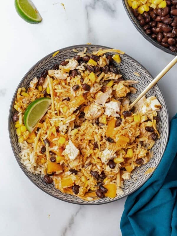 Overhead view of Southwest Bowls in a gray bowl with a spoon.