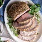 Overhead view of pork loin cut into slices.