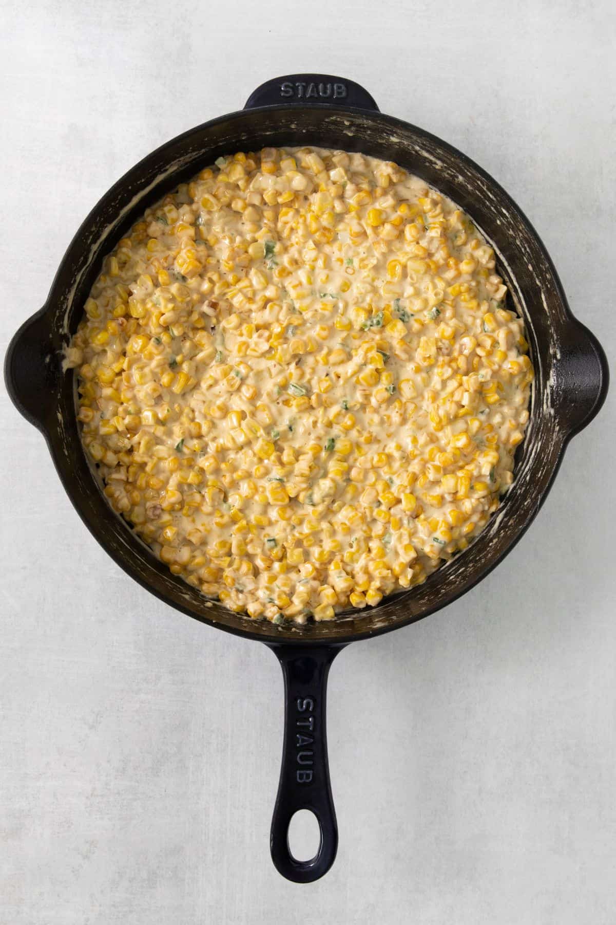 Heavy cream, cream cheese, and Monterey jack added to the skillet and all melted for creaminess.