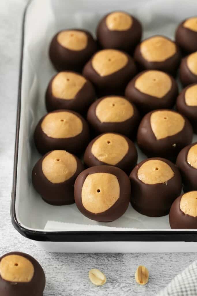 homemade peanut butter buckeyes on a pan