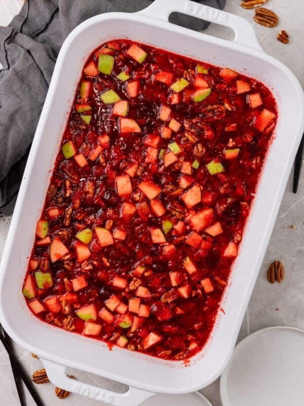 Overhead view of cranberry jello salad in a 9x13 baking dish.