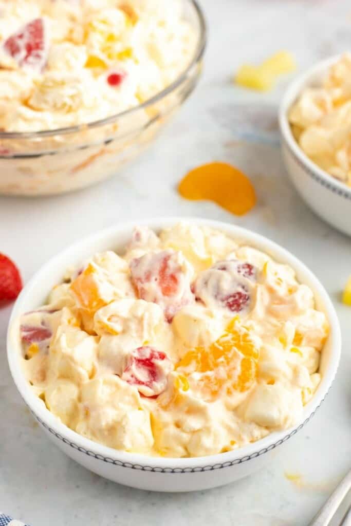 serving mandarin orange salad cool whip in a small bowl.