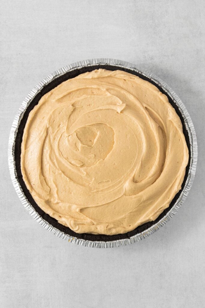 Cool whip peanut butter pie in an Oreo pie crust.