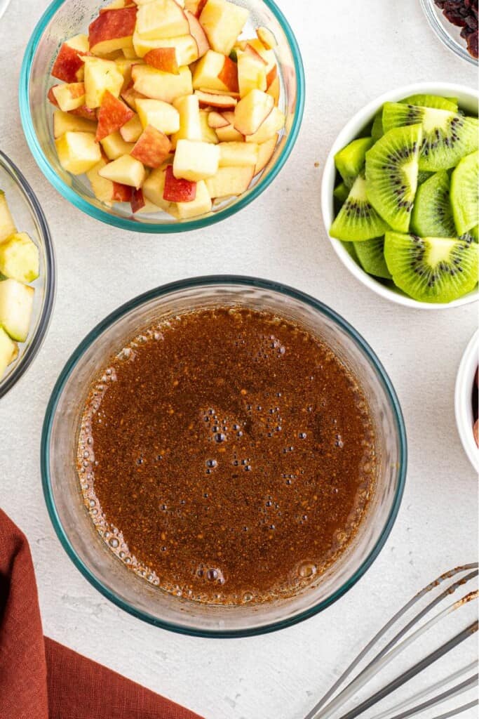 making fruit salad dressing.