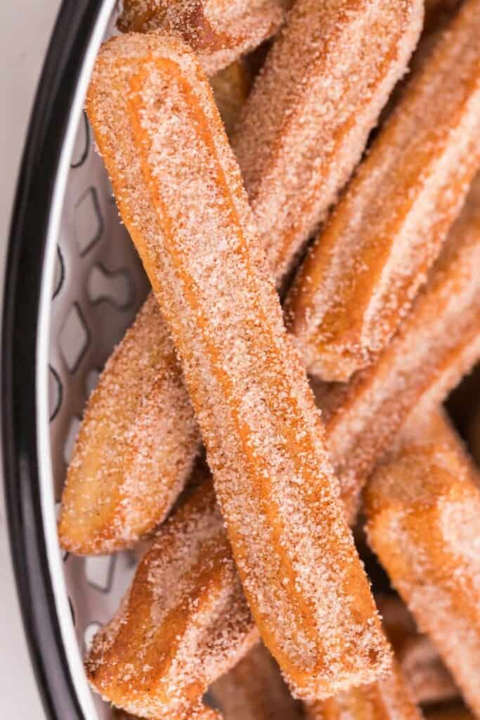 close up of single sugary churro bites