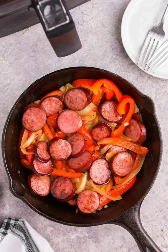 eating air fryer kielbasa with sauteed bell peppers.