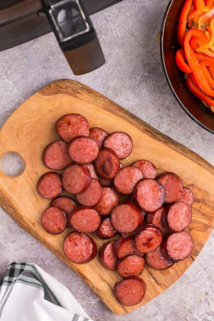 sliced air fryer kielbasa on a cutting board