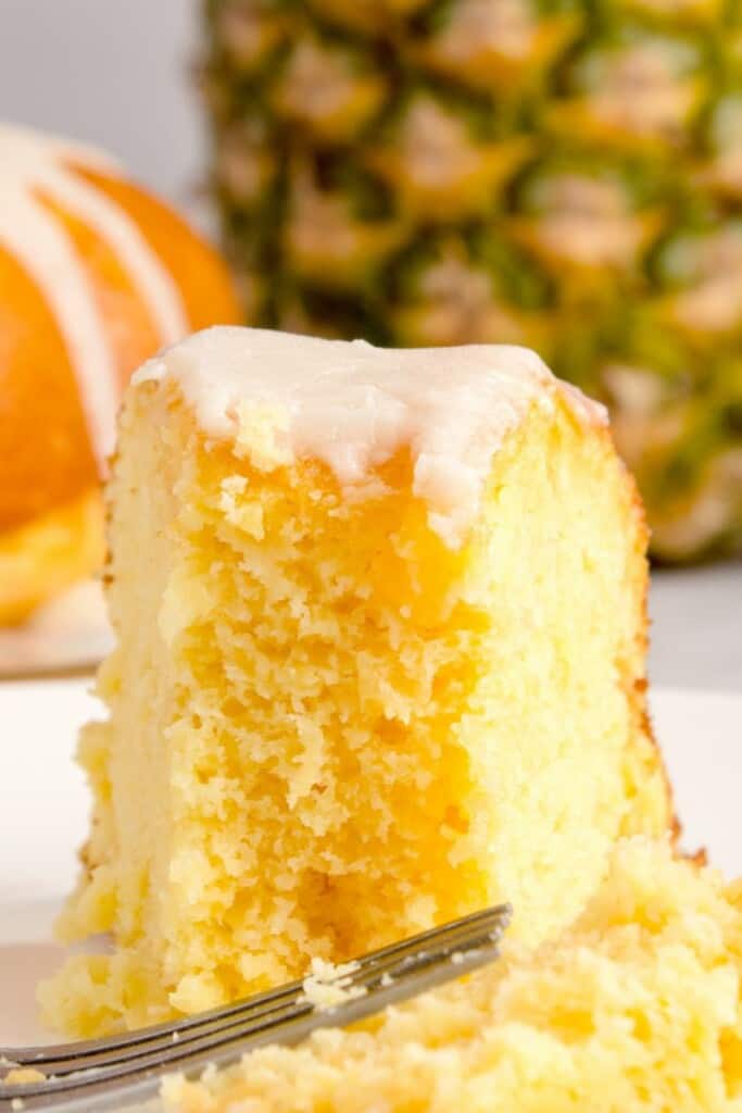 taking a bite out of pineapple cream cheese pound cake
