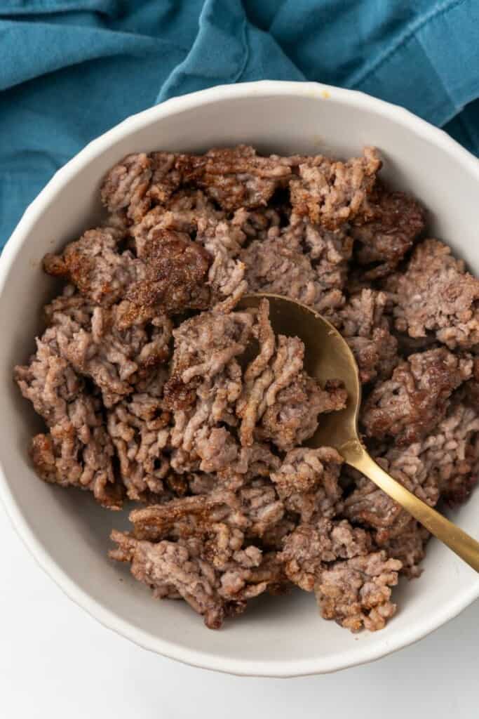Seasoned ground beef cooked and served in a bowl.