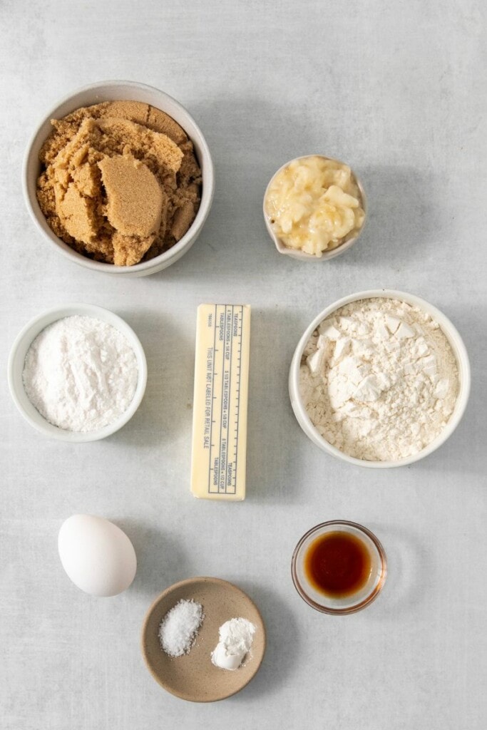 Ingredients for banana pudding brownies portioned in small bowls.
