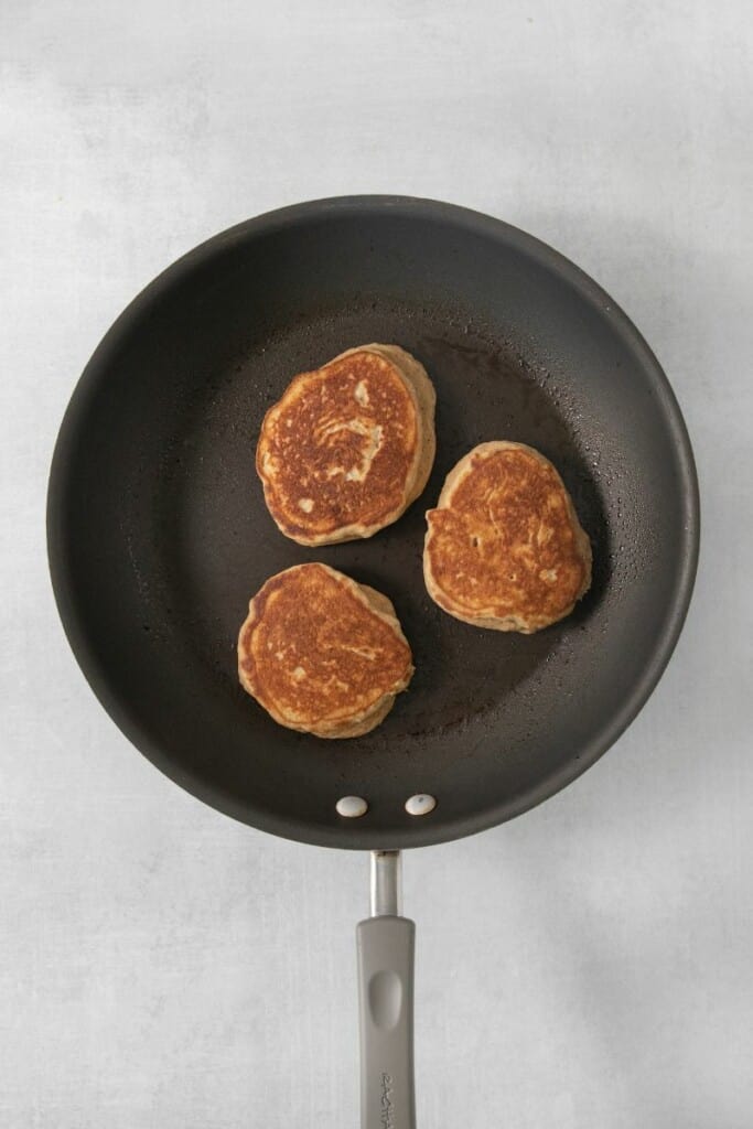 Making mini pancakes in a non-stick skillet.