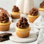 Cupcake with dark chocolate cream cheese topping.