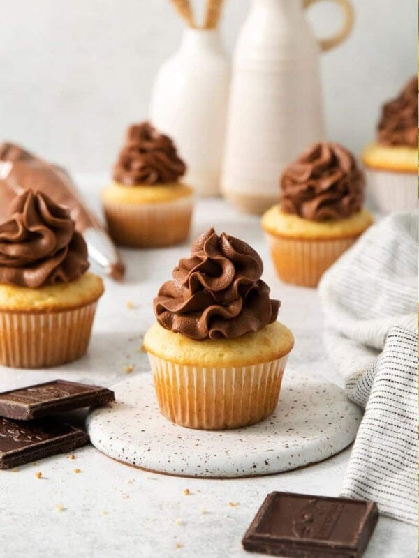 Cupcake with dark chocolate cream cheese topping.