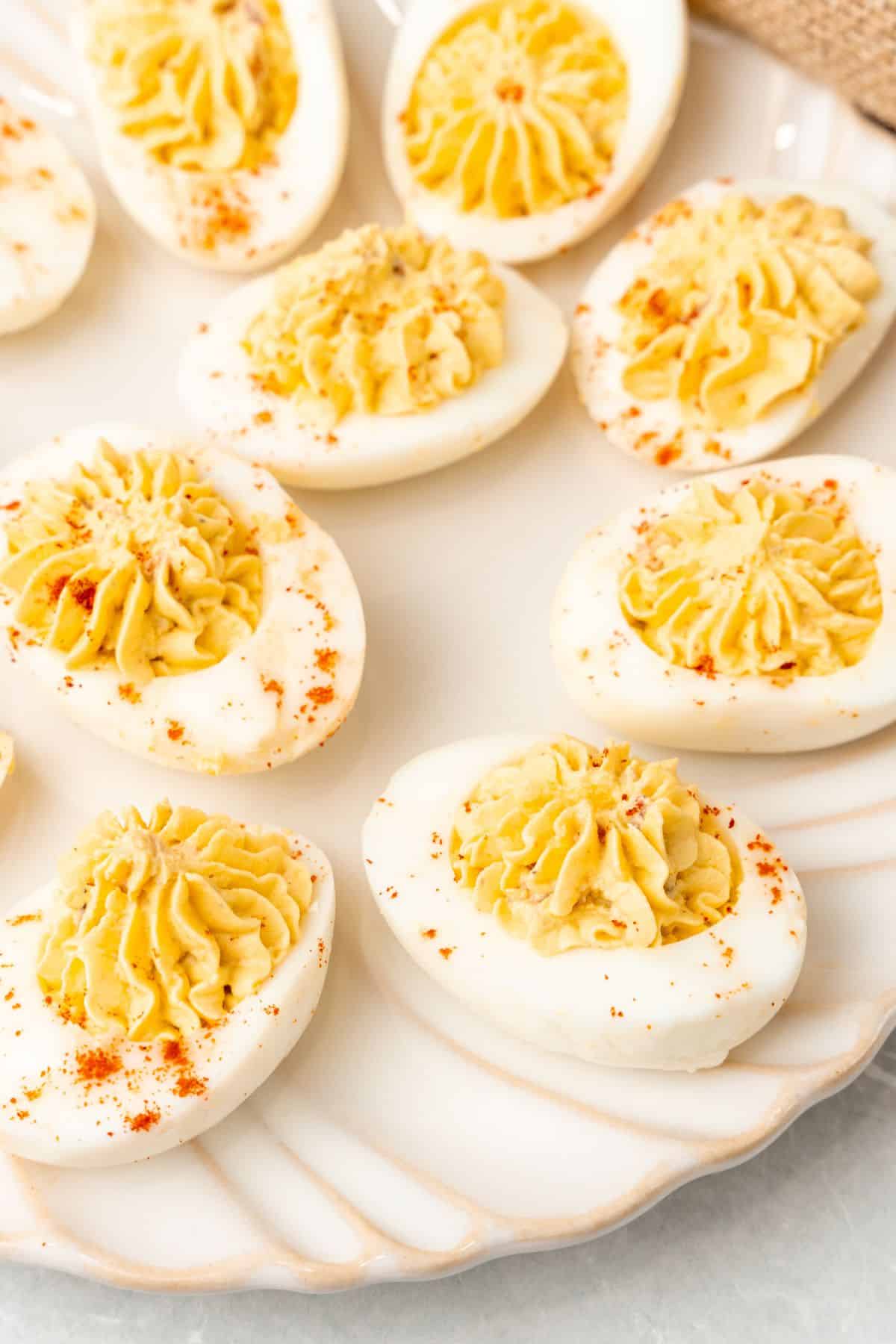 Close up of the deviled egg recipe on a serving platter.