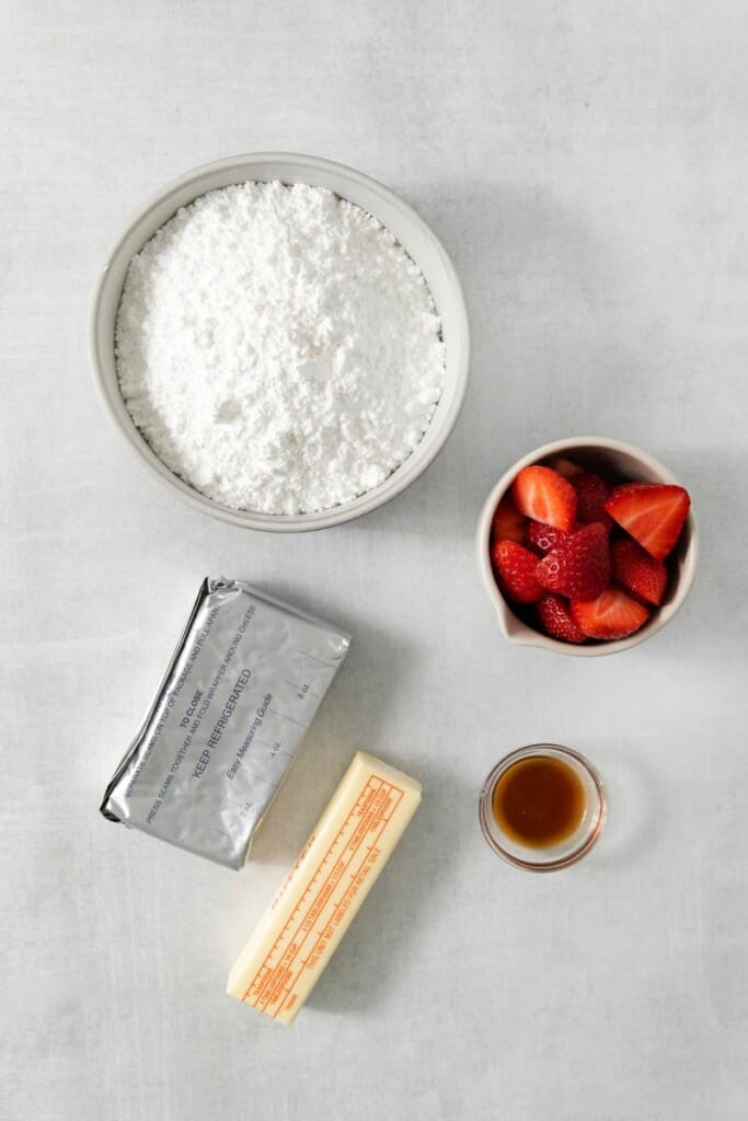 Ingredients for strawberry cream cheese frosting.