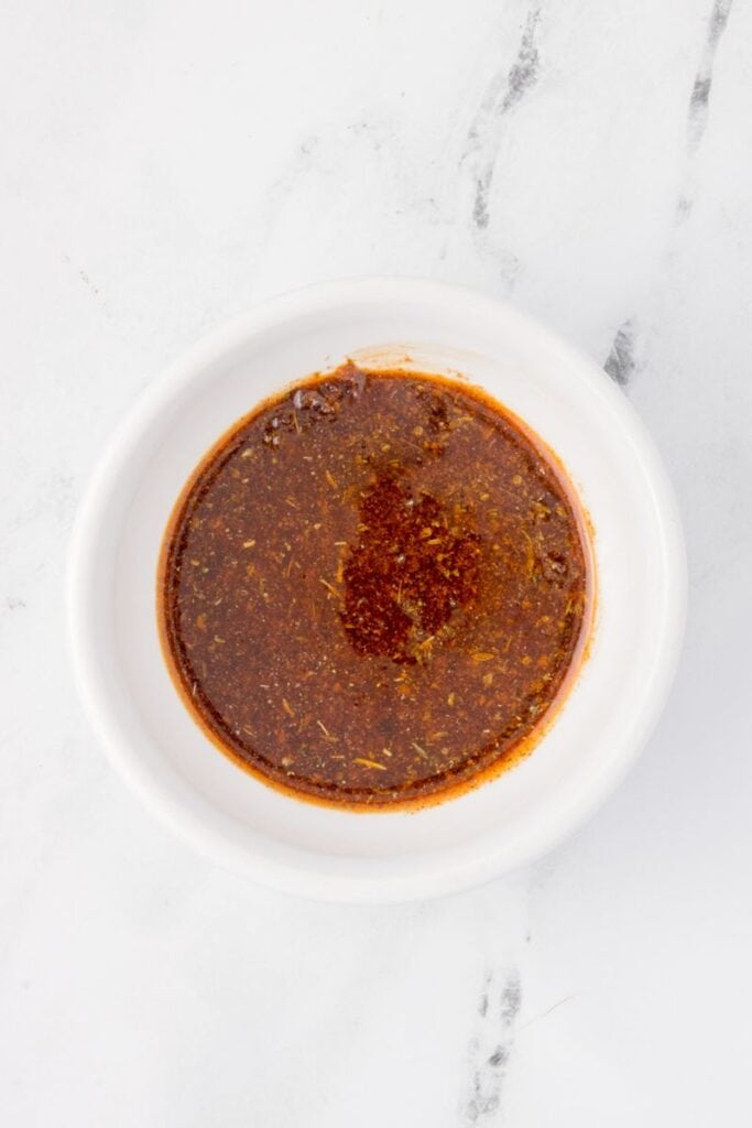 mixing spice rub with olive oil