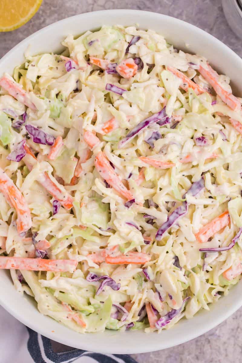 homemade coleslaw in a white bowl