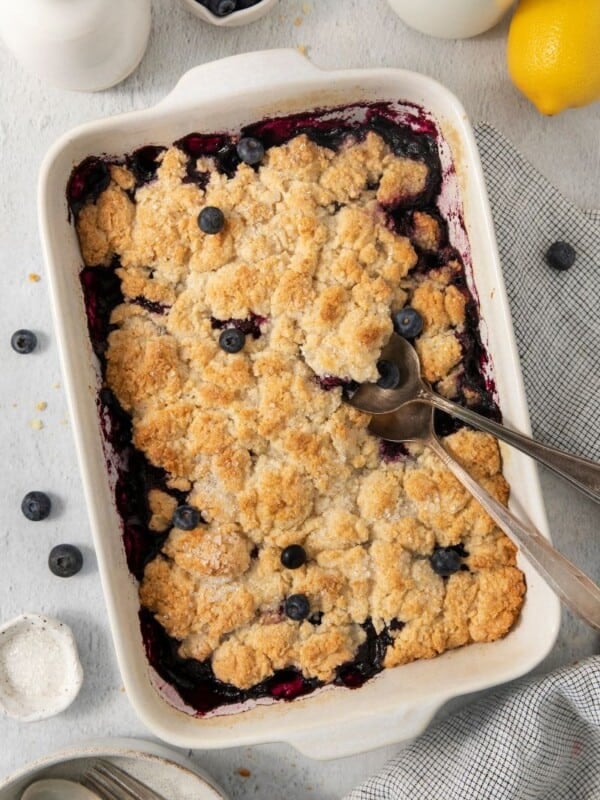 overhead shot of blueberry cobbler in a baked dish