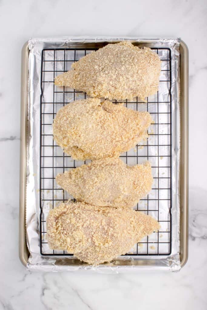 baking raw chicken cordon bleu on a sheet pan in the oven