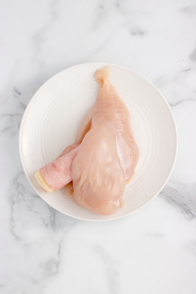 stuffing chicken breast with rolled swiss cheese and ham