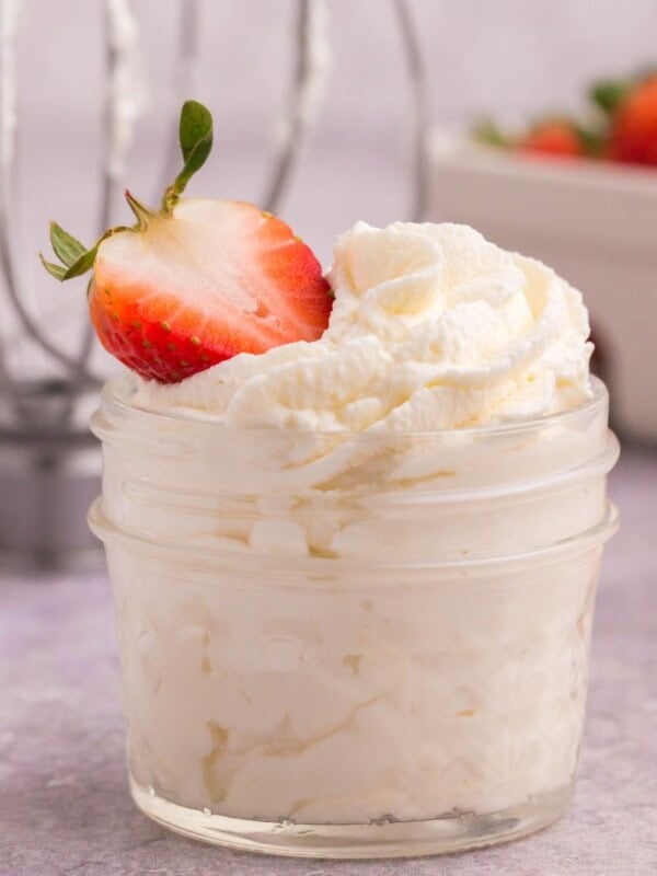 fresh homemade whipped cream in a small mason jar