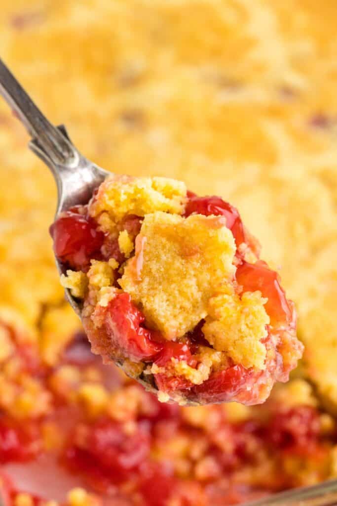 a spoonful of fresh cherry dump cake pie