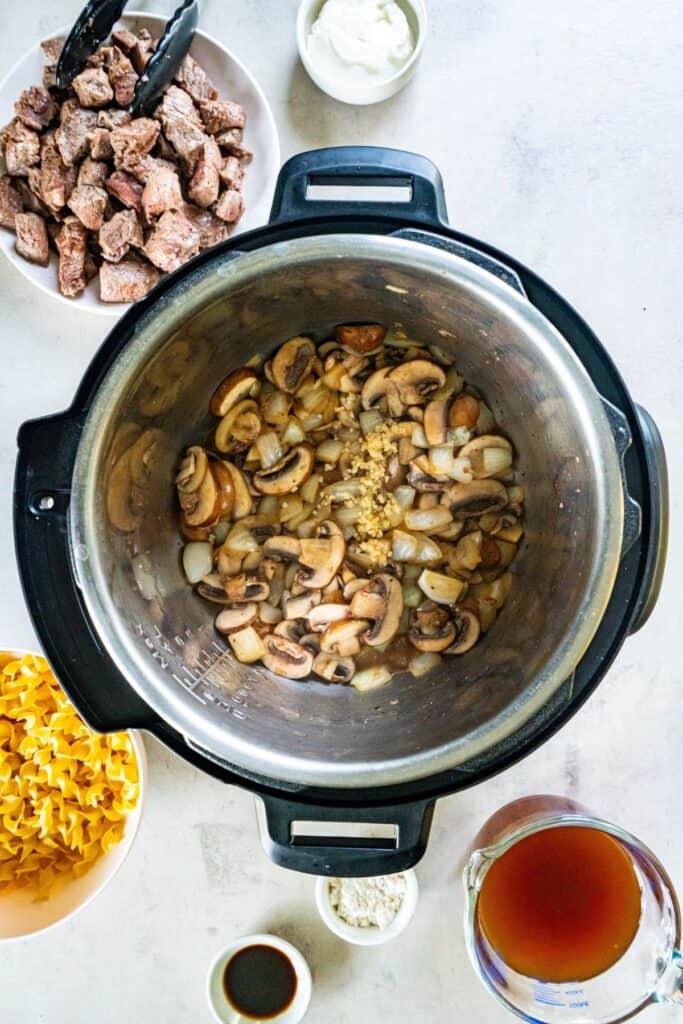 Mushrooms being cooked in the Instant Pot for the stroganoff.
