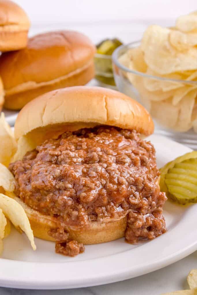 serving sloppy joe ground meat on a hamburger bun