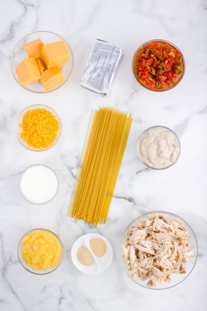 Ingredients needed to make chicken spaghetti.