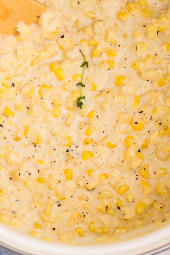 close up of creamed corn in cooking pot.