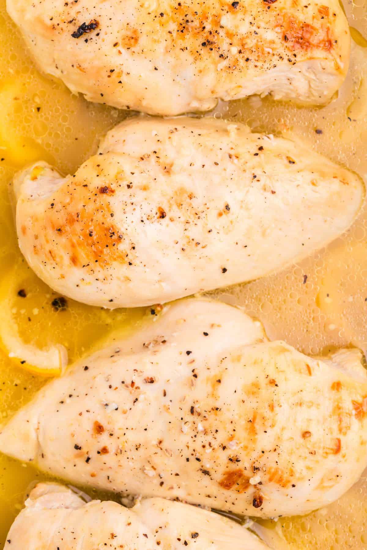Close up of the lemon chicken recipe in the serving dish to see the golden brown on the chicken.